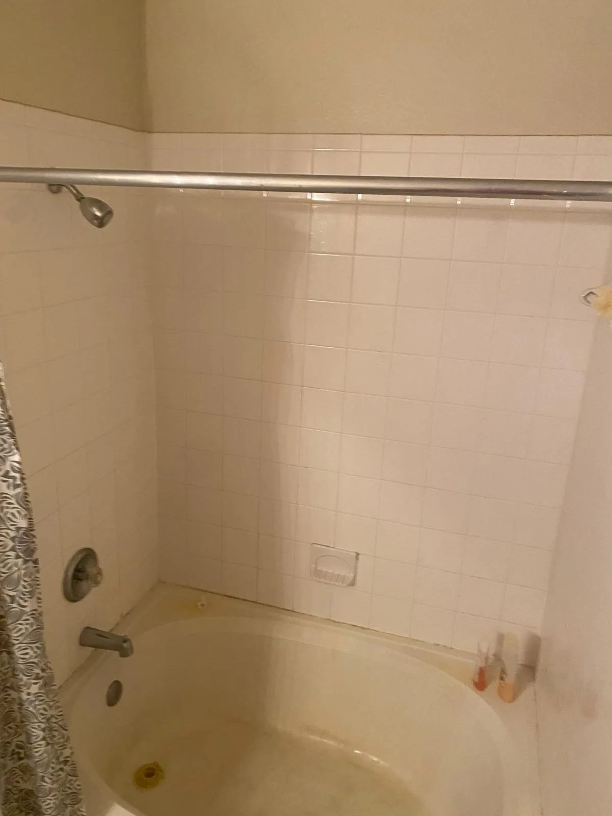 The same bathtub after deep cleaning bright and residue free