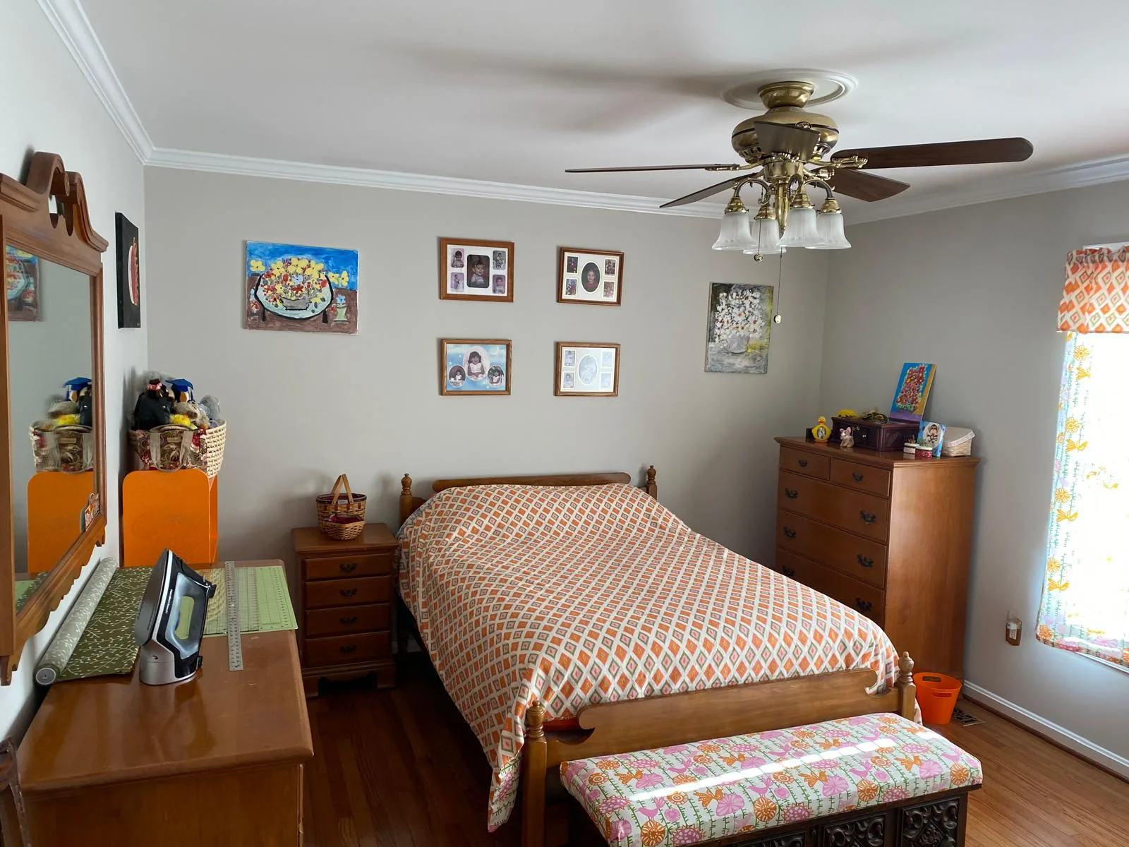 Guest bedroom cleaned with the bed made and linens smoothed